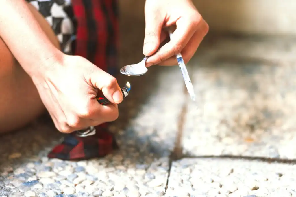 Heroin drug preparation with lighter