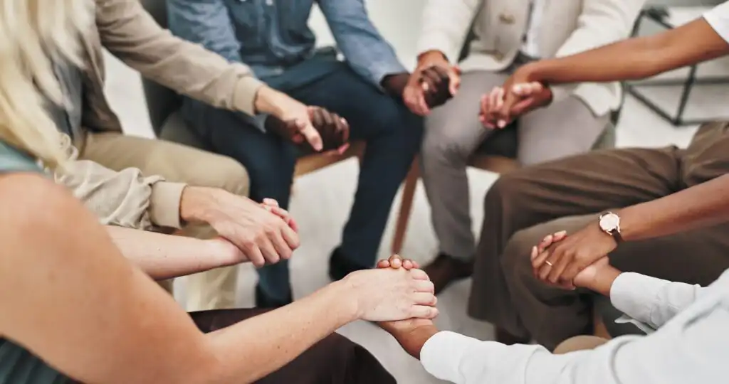 People,,Group,And,Therapy,For,Mental,Health,,Holding,Hands,And