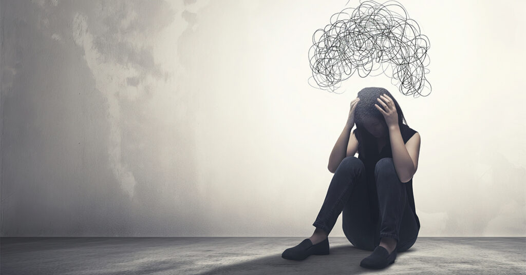 Woman experiencing emotional distress during meth withdrawal, representing common withdrawal symptoms and recovery stages.
