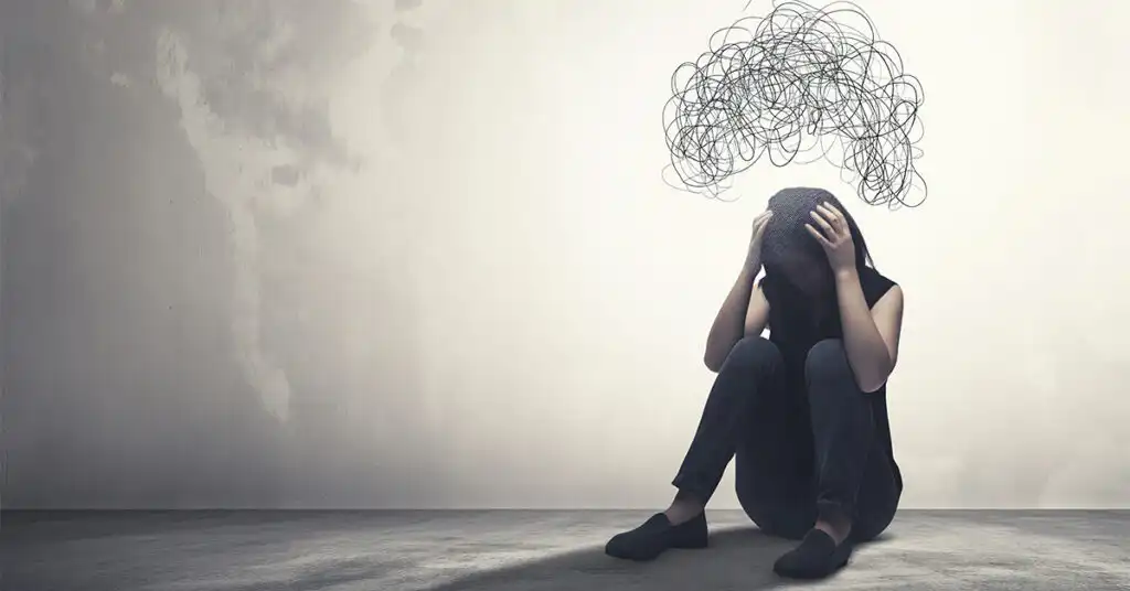 Woman experiencing emotional distress during meth withdrawal, representing common withdrawal symptoms and recovery stages.